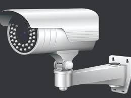 Security camera and entrance gate showing CCTV protection at Unique Ladies PG